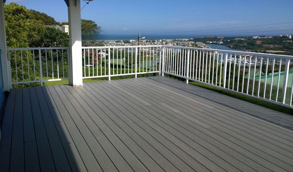 Hillside deck opening onto a valley view