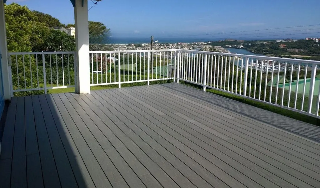Hillside deck opening onto a valley view