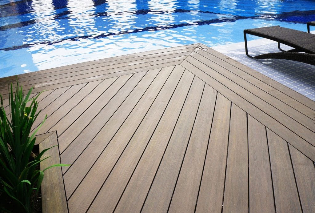 Poolside deck in a warm, multi-tonal finish