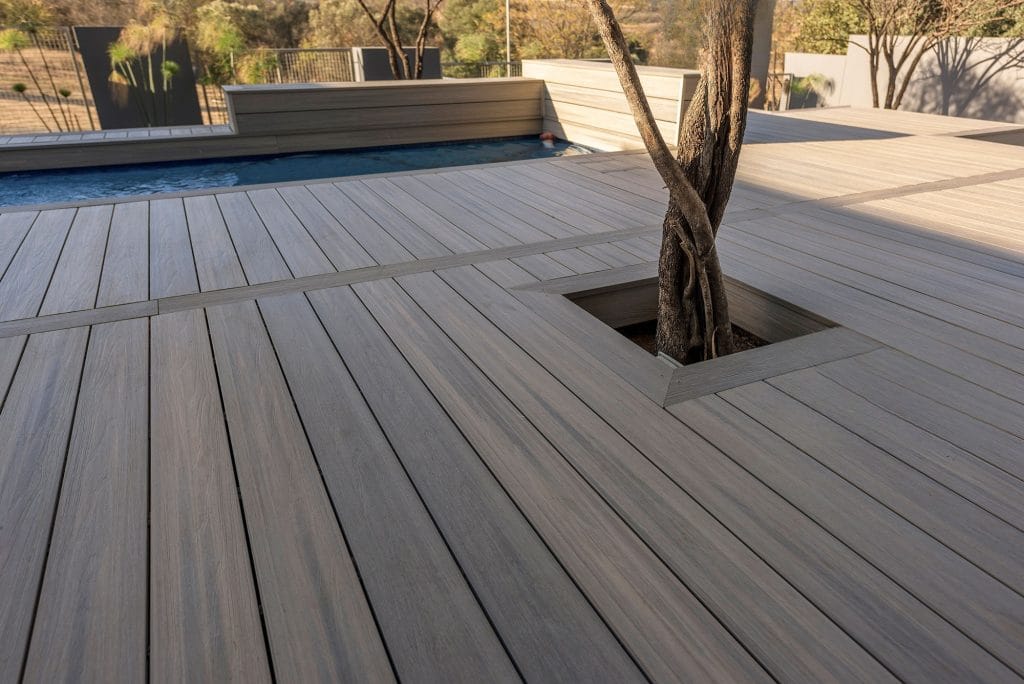 Boards cut around a mature tree