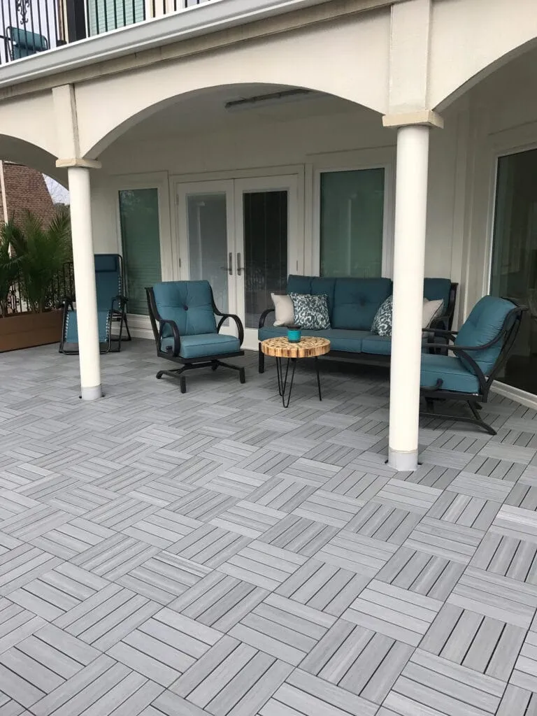 Interlocking deck tiles on a covered porch