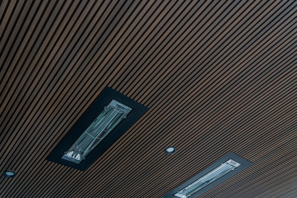 Dark cladding along an office roofline
