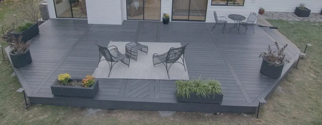 Gray composite deck terrace with outdoor seating