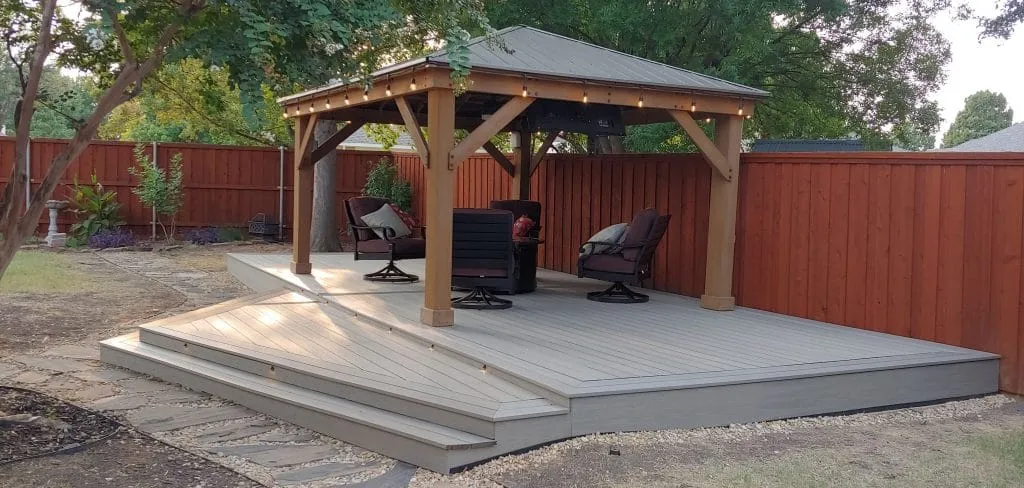 Backyard gazebo and composite privacy fence