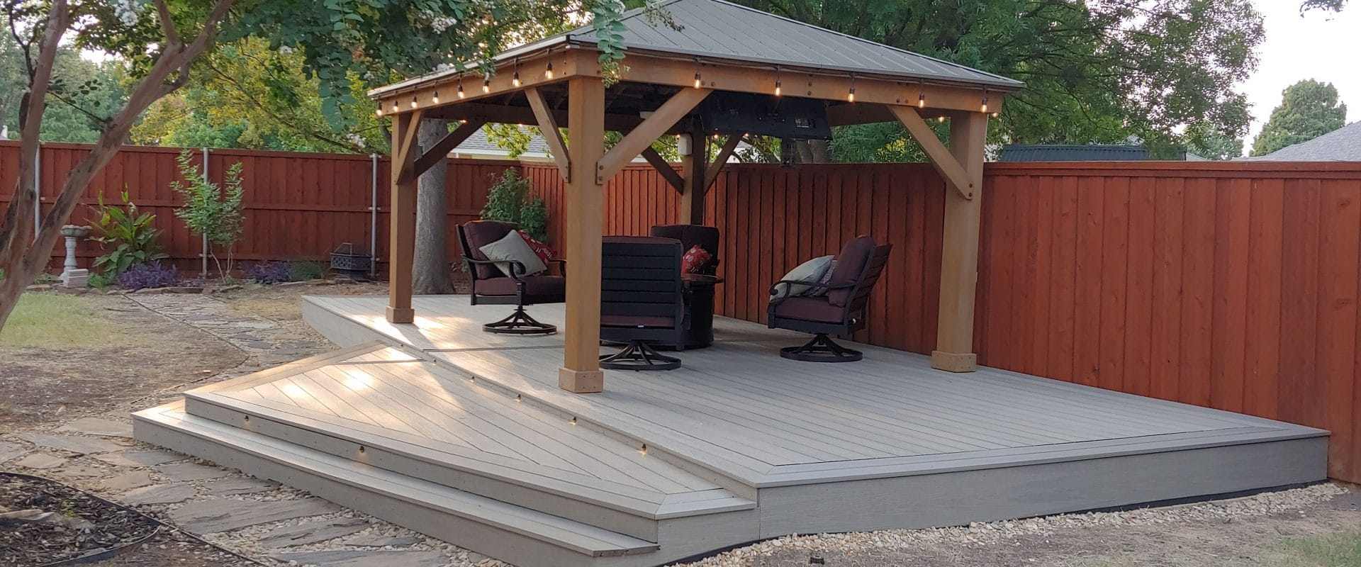 Backyard gazebo and composite privacy fence