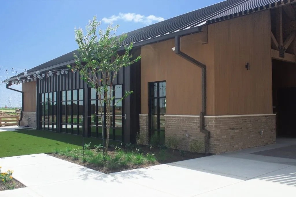 NewTechWood board and batten composite siding on a building exterior