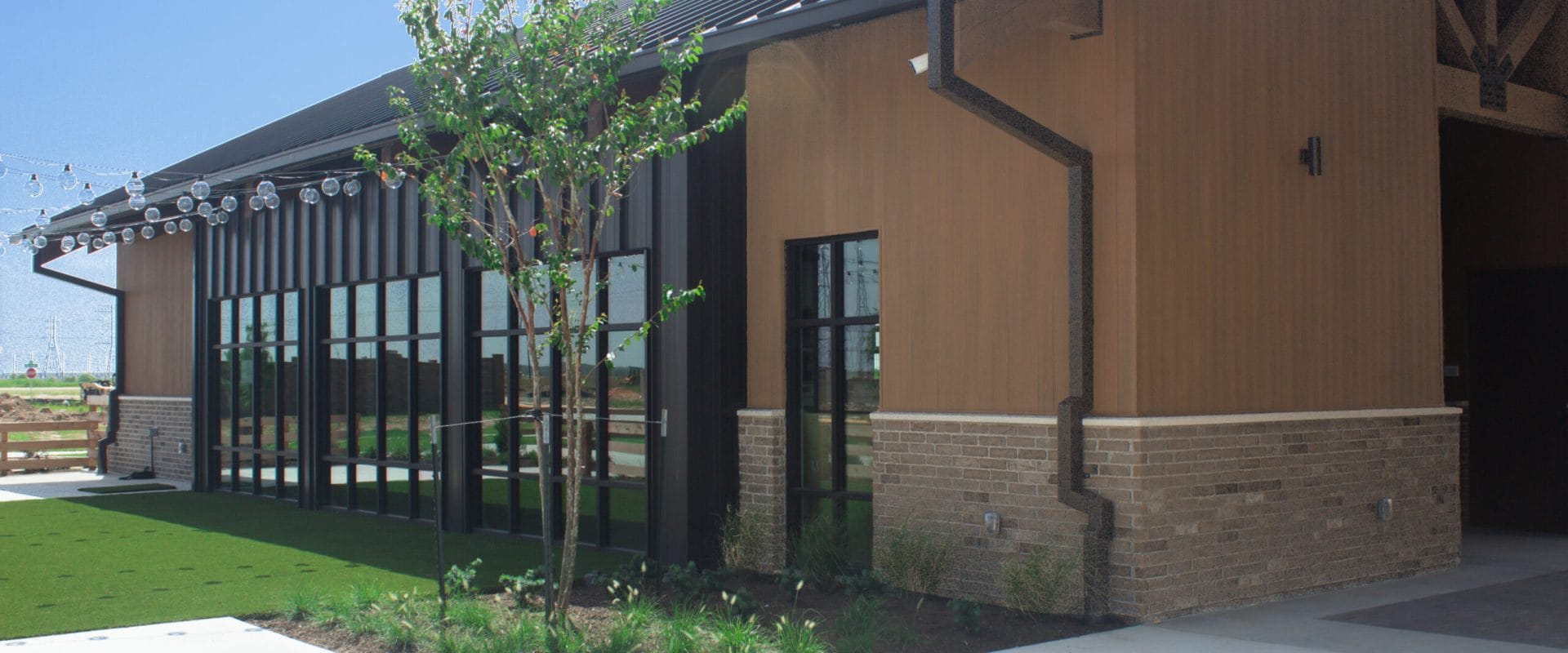 NewTechWood board and batten composite siding on a building exterior