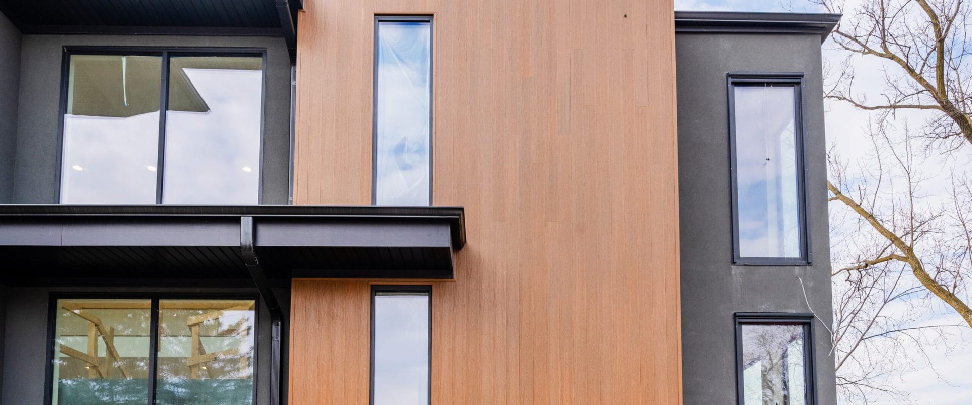 NewTechWood Shadowline composite siding on a modern home facade